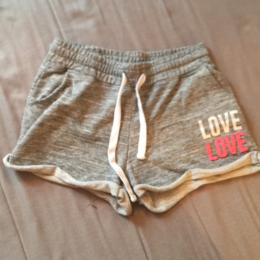 gray shorts with love decal